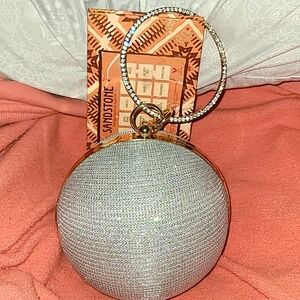 NWOT Beautiful Sparkling Silver Round Clutch
